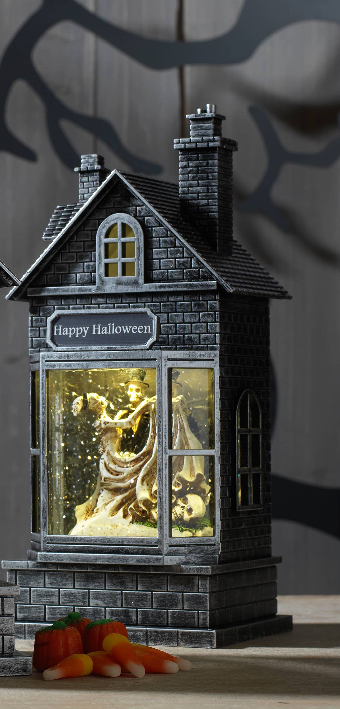 10.5 Inch Lighted Haunted House Spinning Halloween Water Globe, Skeleton Couple