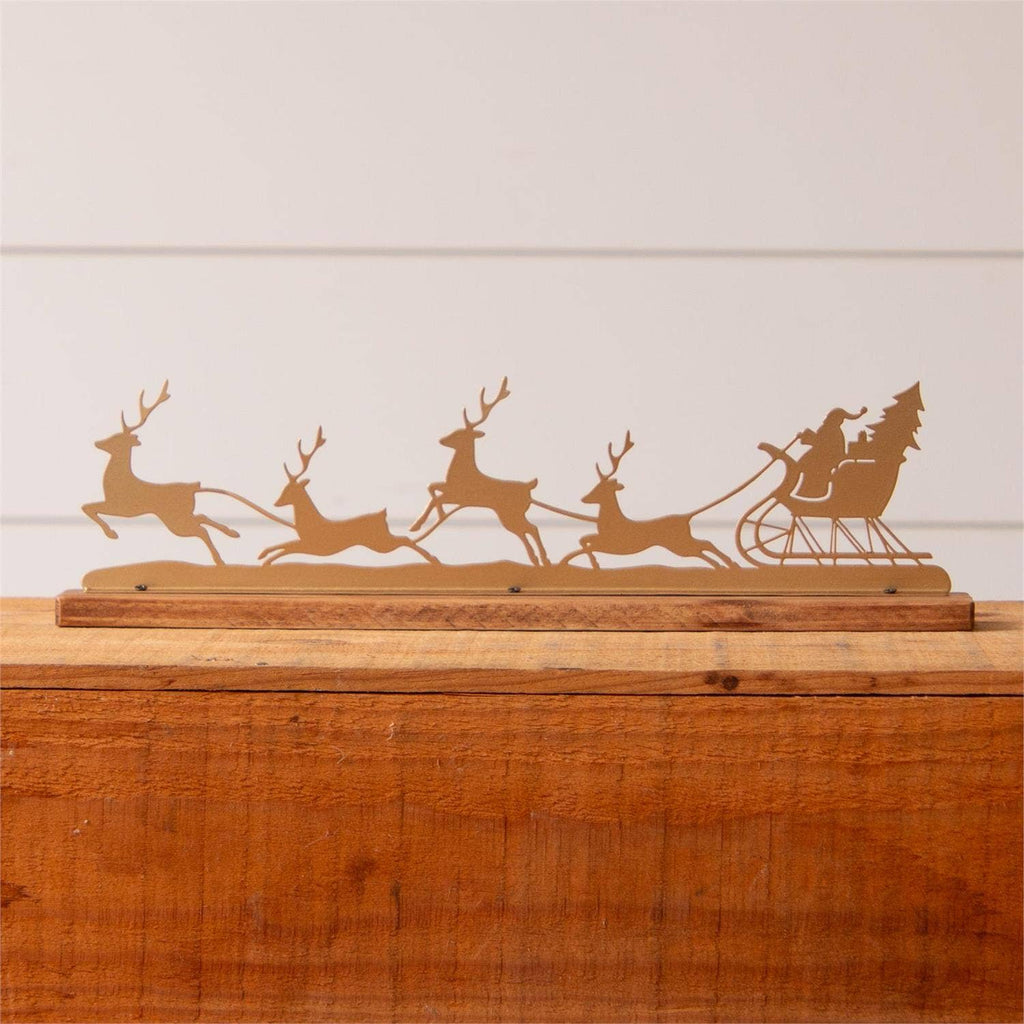 Santa And Reindeer Gold Silhouette